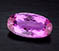 small-37.63ct Oval Vivid Pink Topaz- Photo by R. Weldon